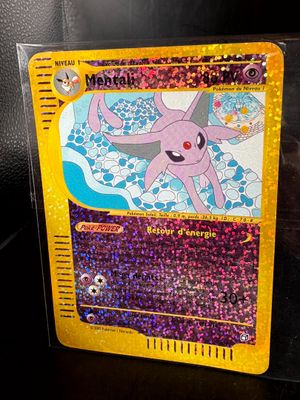 a close up of a pokemon card on a table