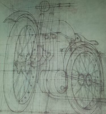 dessin d'une moto sur une feuille de papier posée sur une table