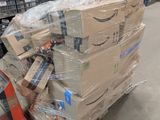 a large pile of boxes sitting on a dolly in a warehouse