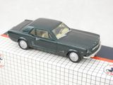 a toy car sitting on top of a box on a table