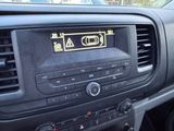 the dashboard of a car with a digital display on the dash
