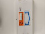 a plastic container with a blue handle next to a plastic container with a blue handle