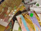 a box full of craft supplies on a table