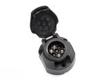 a close up of a black electrical plug on a white background
