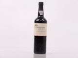 a bottle of wine that is sitting on a table