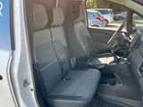 the interior of a van with the driver ' s seat folded down