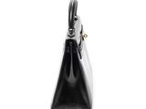black leather handbag on white background with clipping for text
