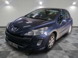 a picture of a blue car parked in a garage