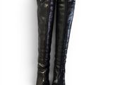 a pair of women ' s black boots on a white background
