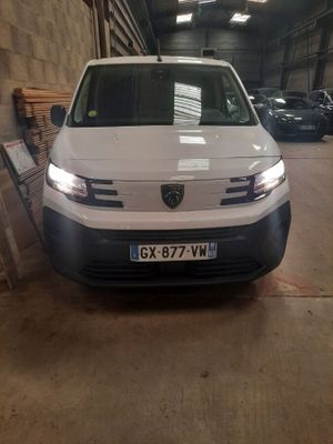 a white van that is parked in a garage