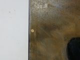 a painting on the wall of a room with a black object in it