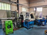 many machines that are sitting in a room together