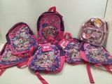 a group of backpacks that are sitting on a table