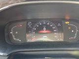 a car dashboard with a speedometer and a dash light