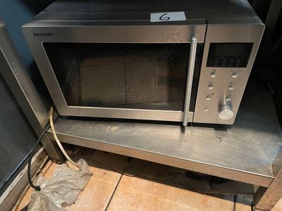 a microwave that is sitting on top of a table