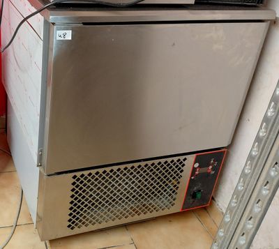 a microwave that is sitting on top of a stove