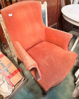 Fauteuil confortable en velours côtelé.