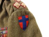 a close up of a jacket with a cross on it