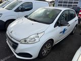 a white car parked in a parking lot with other cars