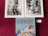 trois livres sont posés sur une nappe rouge, sur une table