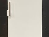 an image of a white refrigerator in a room