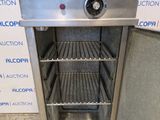 an image of a stainless steel oven with a door open