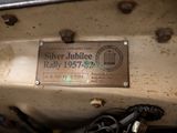 a plaque on the back of a motorcycle that reads silver jubilee rally 1937