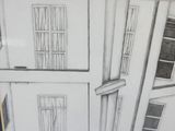 a picture of a drawing of a house on the wall