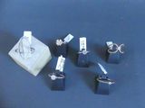 a box of rings and a ring holder on a table