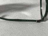 a close up of a pair of glasses on a table