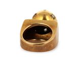 an image of a gold ring with a black stone in the middle