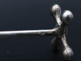 a close up of a pair of scissors on a table