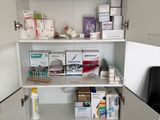a medicine cabinet in the corner of the room