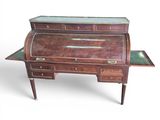 an antique writing desk with two drawers and a glass top