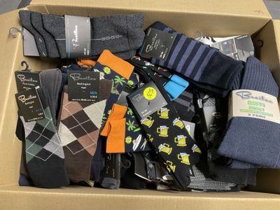 a box full of men ' s socks and socks