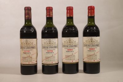 trois bouteilles de vin sont alignées sur une surface blanche