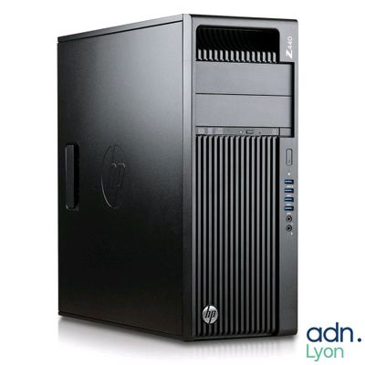 a black desktop computer with a hard drive on top of it