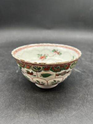 a close up of a small bowl on a table