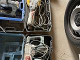 a lot of tools that are sitting on the floor