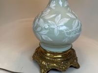 Paire de vases en porcelaine céladon à décor feuillagé, la m… (photo 2)