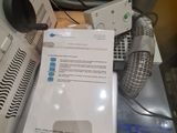 a desk with a computer and a telephone on it