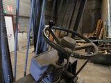 an image of a forklift in a warehouse