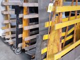 several pallets of wood are stacked on a pallet in a warehouse