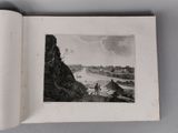 a picture of a book with a picture of a river in it