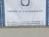 a certificate that is on the wall of a building