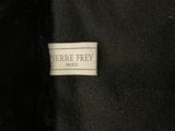 a close up of a label on a black jacket