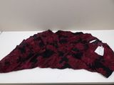 maroon and black floral dress on a white table