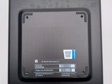 a picture of a laptop with a battery on top of it