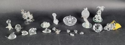 a lot of glass figurines sitting on a table
