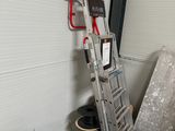 a ladder that is sitting next to a pile of wires